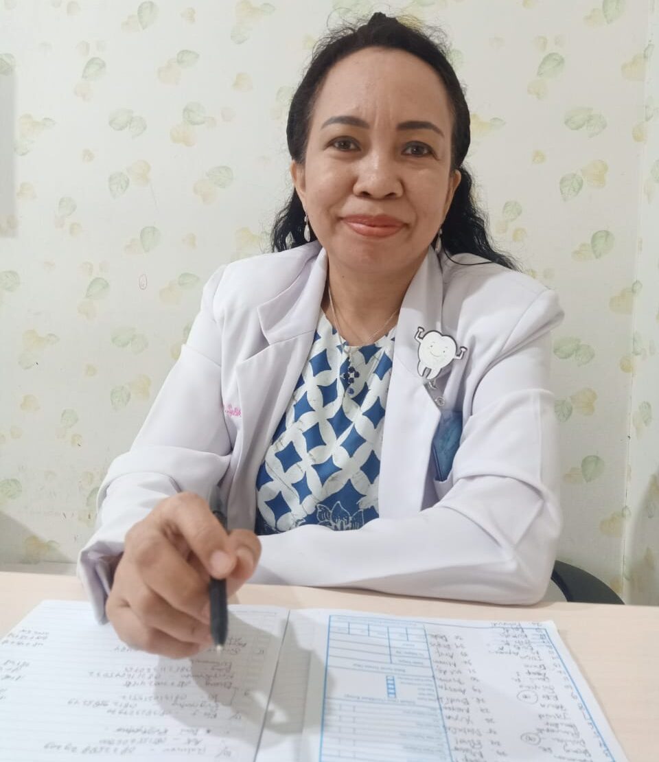 drg. Rina Simamora, Sp.BM